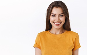 Portrait of woman with beautiful smile after cosmetic dental services