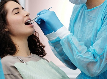 Woman having dental examination