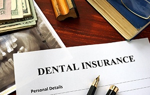 Dental insurance form resting on a table