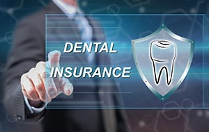Man using technology to learn about dental insurance benefits