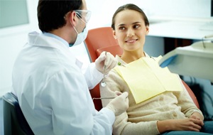 patient talking to dentist