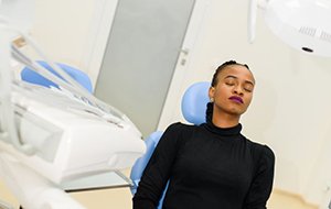 Relaxed dental patient with closed eyes