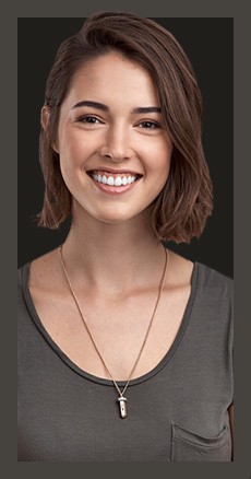 Smiling young woman in a dark gray blouse