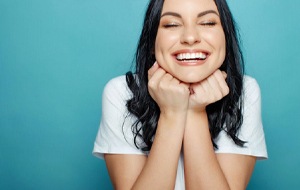 woman grinning after a smile makeover in Jacksonville, FL 