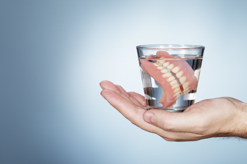 Soaking Dentures How to Take Care of Dentures Dr. William Baxter