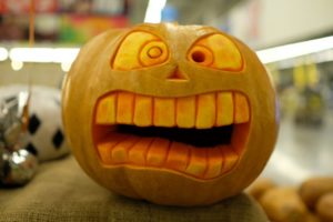 Halloween pumpkin carved with big teeth