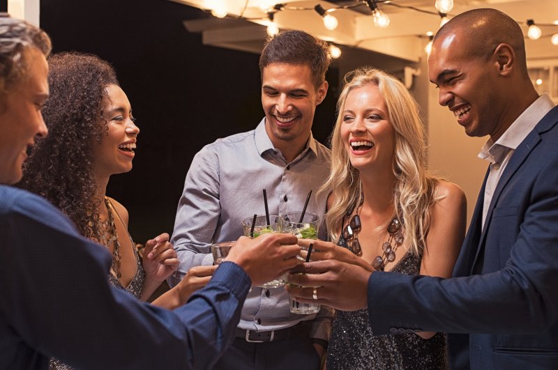 people smiling at New Year’s Eve party in Jacksonville