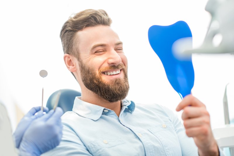 patient talking to their dentist