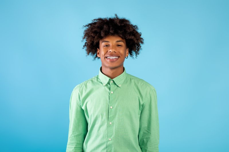 A man smiling as he undergoes a smile makeover